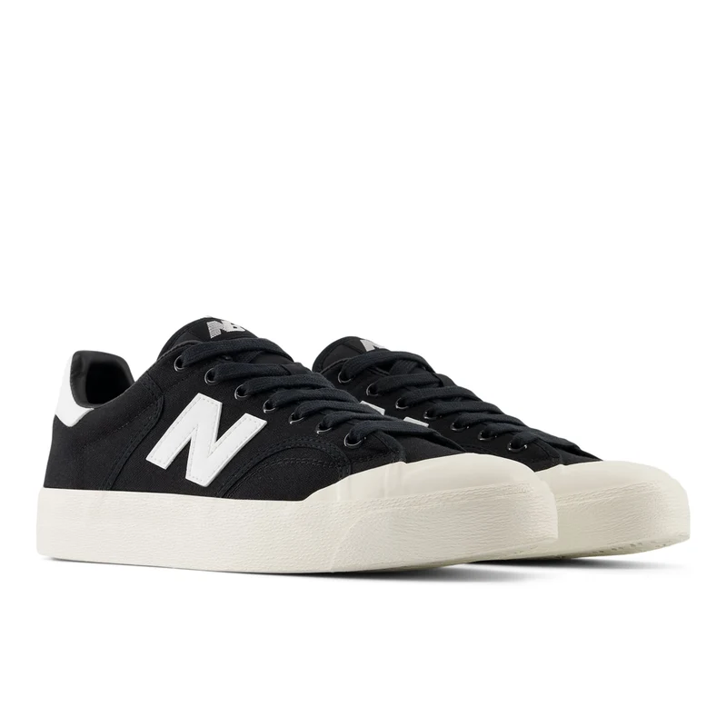 New Balance Herren 100 Fashion Sneaker - Schwarz / Weiß